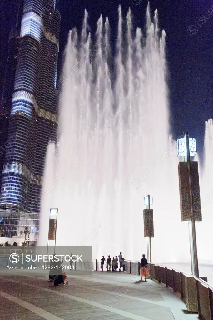 Dubai, United Arab Emirates, view of the city and Burj Khalifa Tower and fountain at night