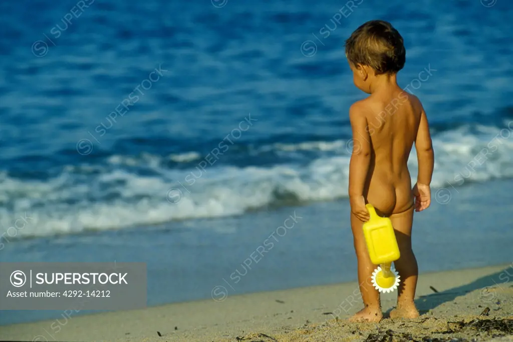 Young boy by the sea