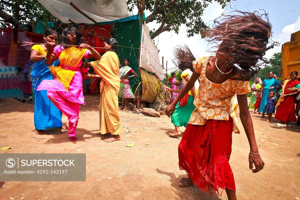 India, Chattisgarth, woman dancing and falling in trance