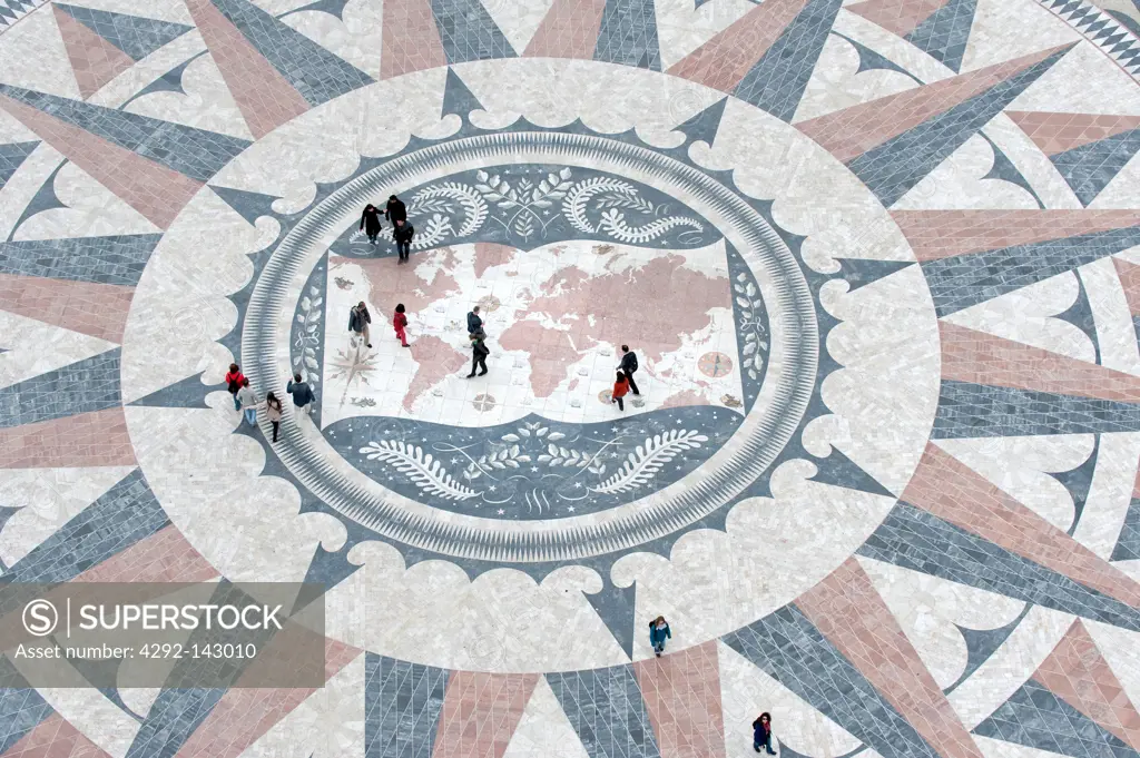 Tourists on a giant world map at the foot of the Monument to the Discoveries, Padrao dos Descobrimentos, Belem, Lisbon, Portugal, Europe
