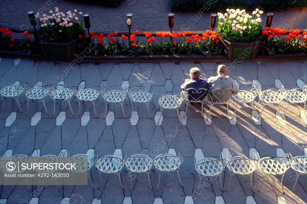 Denmark, Copenhagen, Senior Couple in Tivoli Gardens