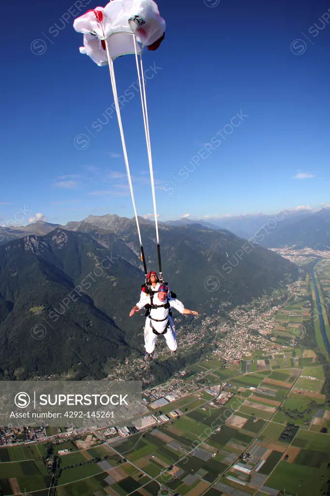 Switzerland, Canton Ticino, parachuting