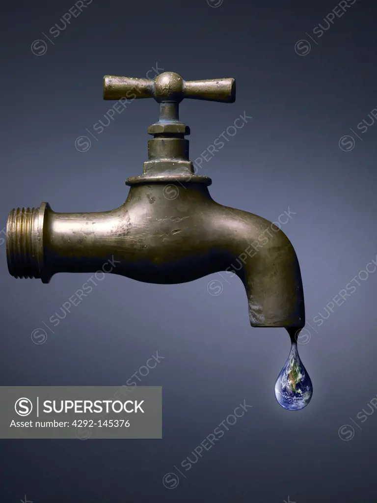 Old tap with world drop, abstract on dark background