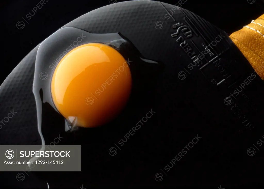 Close-up of egg yolk in a pan