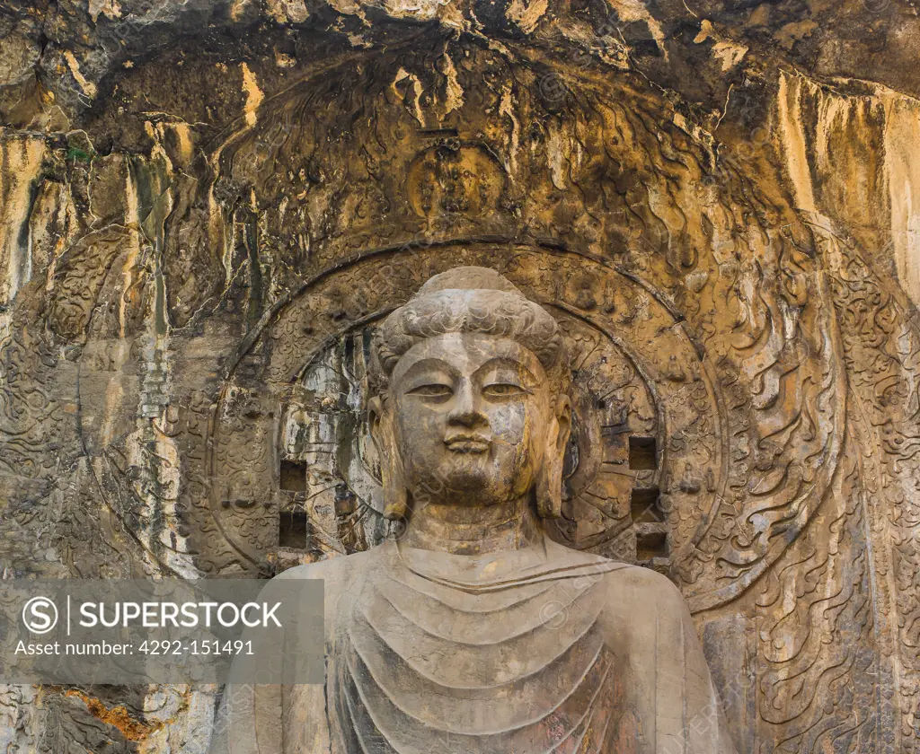 Asia, China, Luoyang, Buddha Vairocana at main wall of Fengxiansi Cave