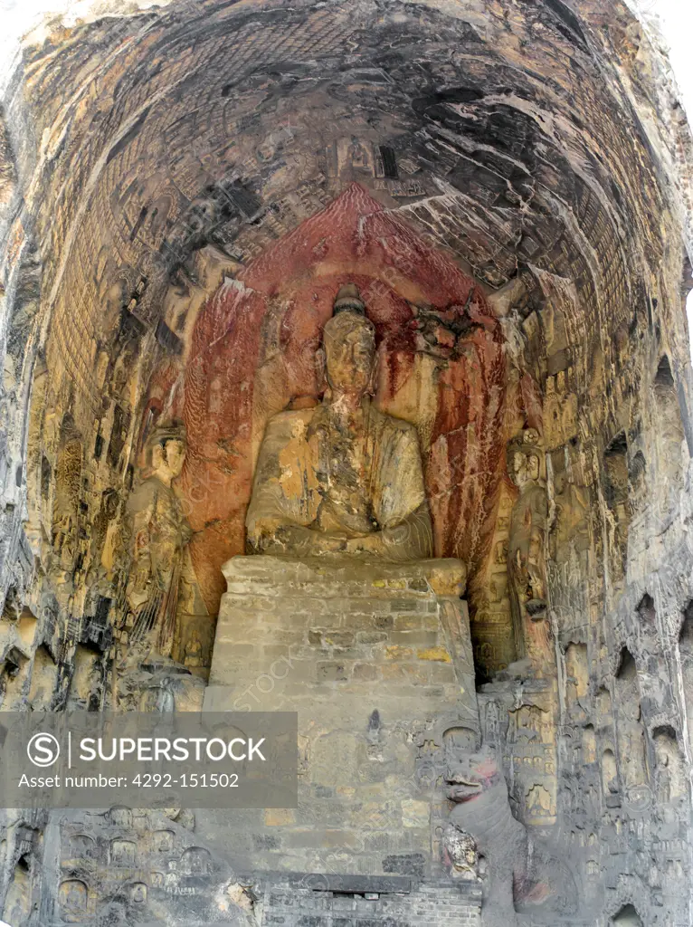 Asia, China, Luoyang, Statue of sitting Buddha at Sakyamuni, Guyangdong Cave