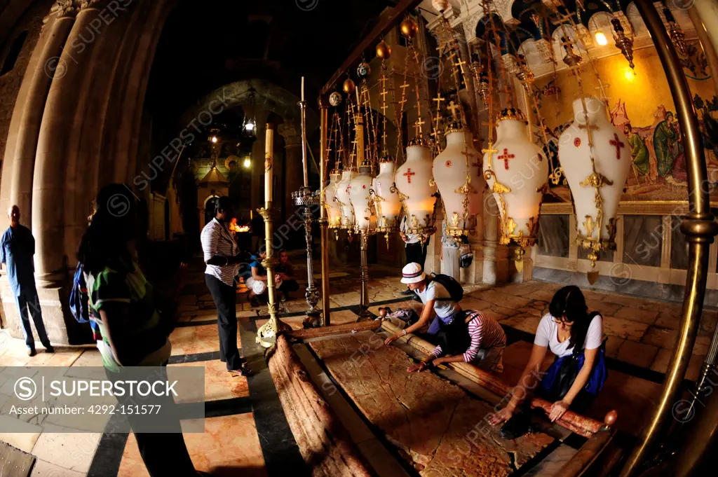 Israel, Jerusalem, Church of the Holy Sepulchre, Praying at the Stone of the Anointing