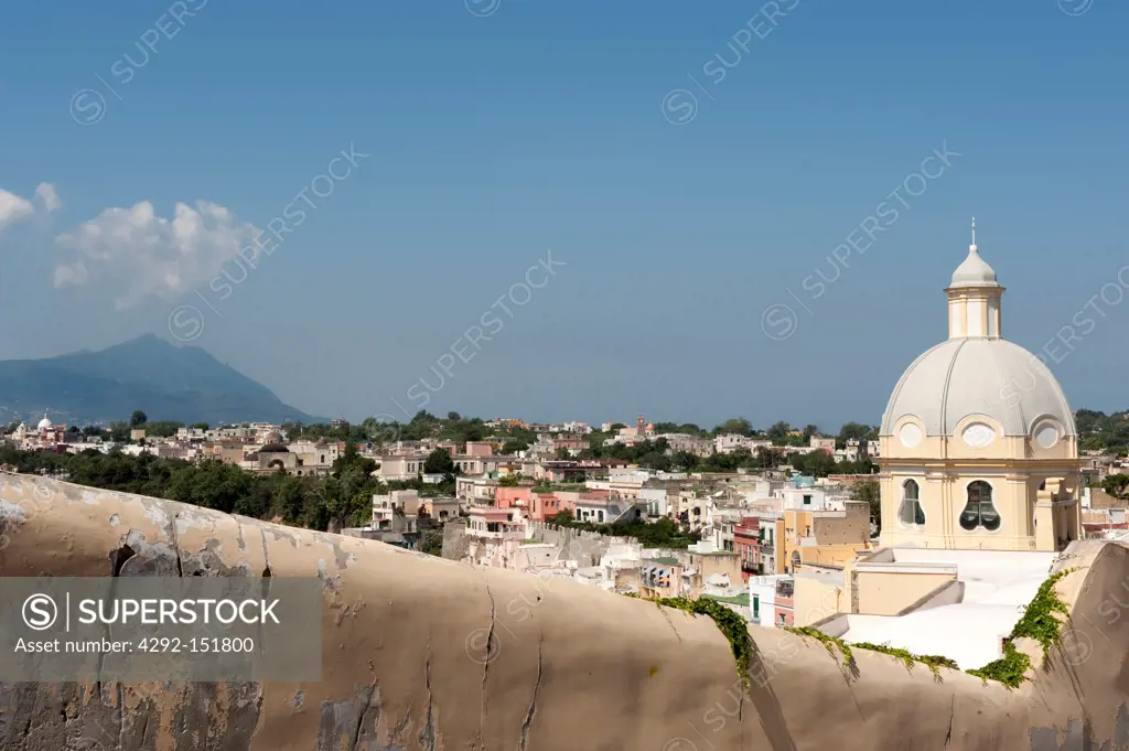 Italy, Campania, Procida, Marina di Corricella and the dome of Santa Maria delle Grazie sanctuary