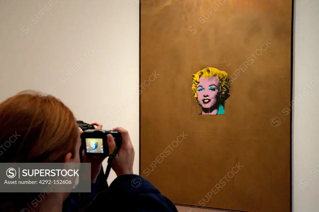 USA,New York City, Manhattan, Museum of Modern Art, MOMA, Woman Taking Picture Gold Marilyn Monroe 1962 by Andy Warhol Artist