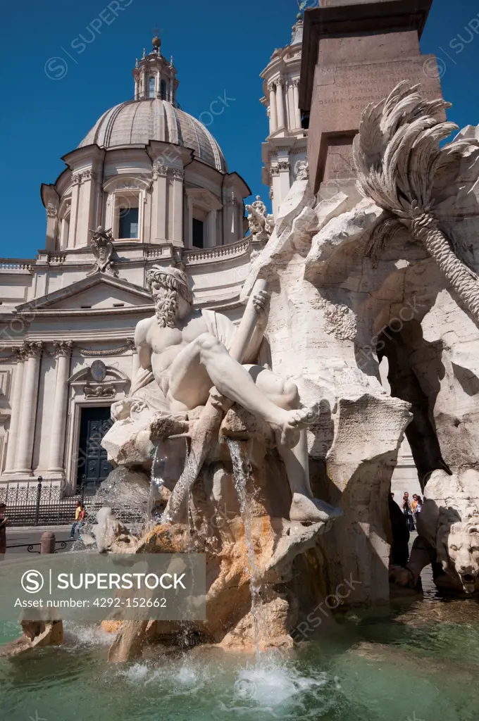 Italy, Lazio, Rome, Piazza Navona, Fountain of the Four Rivers by Gian Lorenzo Bernini background Saint Agnese in Agone Church