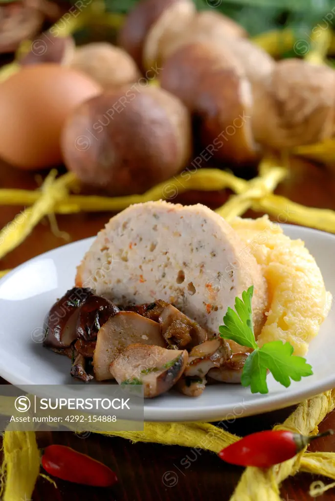 Meat roll slice with mushrooms and polenta
