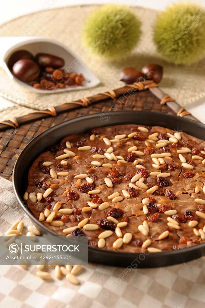 Chestnut cake with pine kernels and raisins