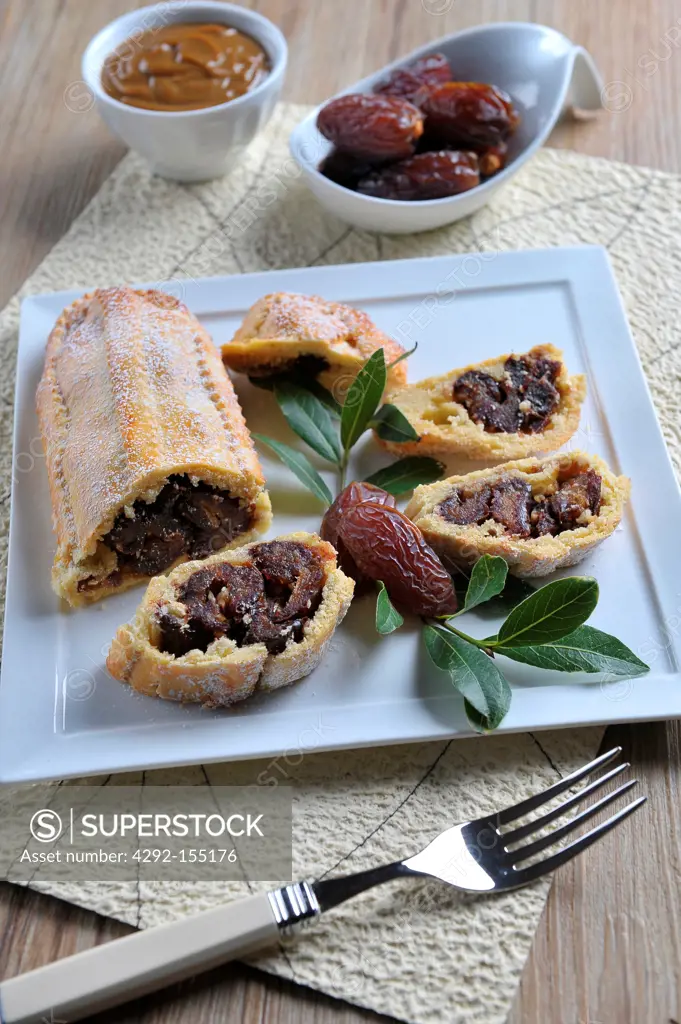 Strudel filled with dates and nuts, with a coffee sauce