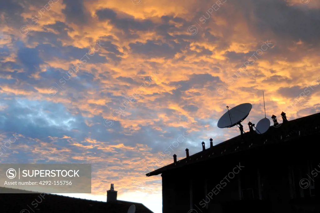 Italy, Lombardy, Milano, parabolic antennas for the reception of the satellite televisions on the roofs