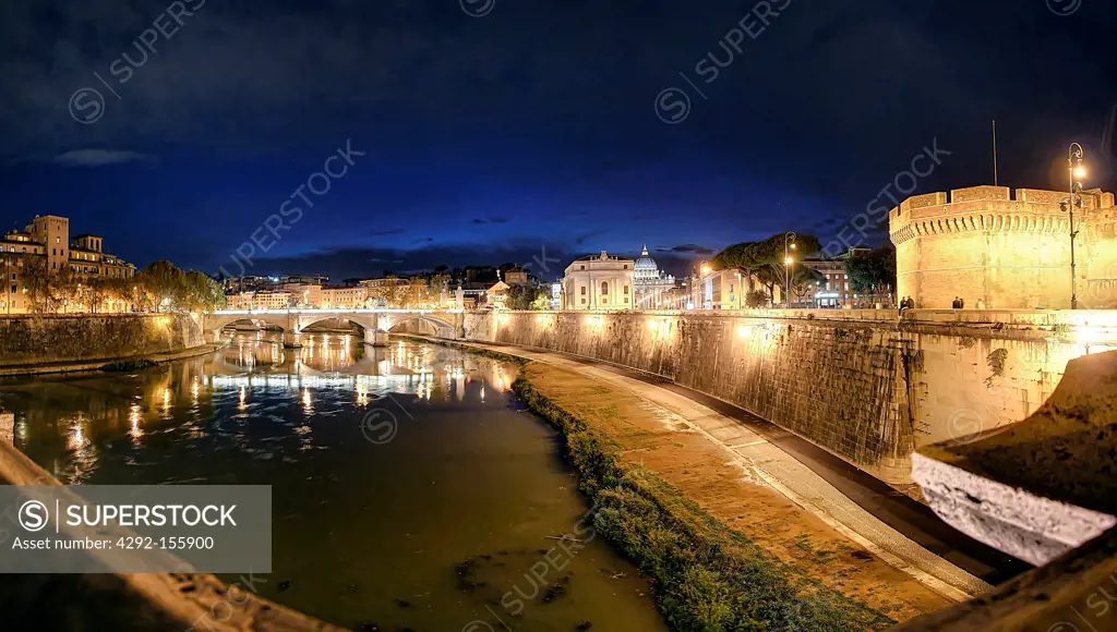 Italy, Lazio, Rome, Skyline from the Tiber by night