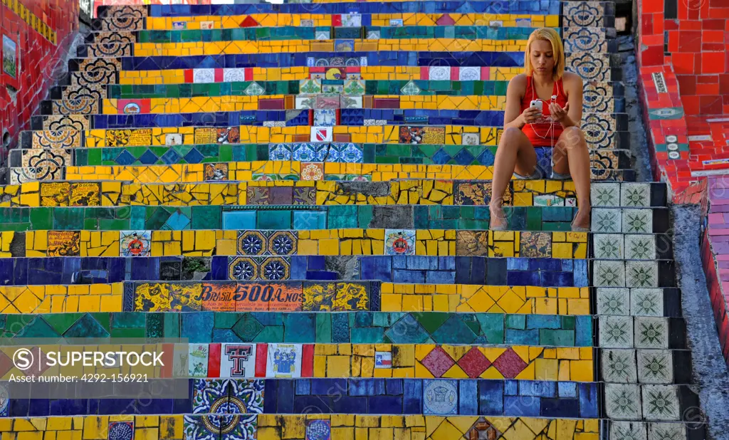 Brazil, Rio de Janeiro, girl on Santa Teresa stairs, Escadaria Selarón