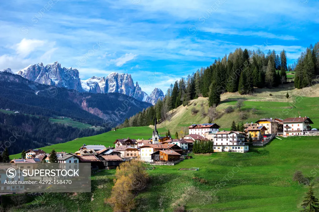 Italy, Dolomites, Trentino Alto Adige, the Moena village and in the background tha Catinaccio mountain