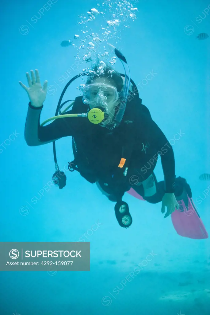 Female scuba diver, Under water , diving, Hurghada, Red Sea, Egypt, Africa.