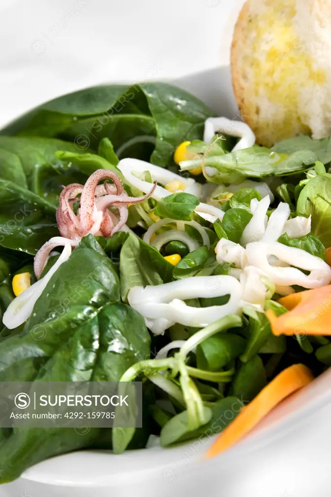 octopus salad with spinach and papaya