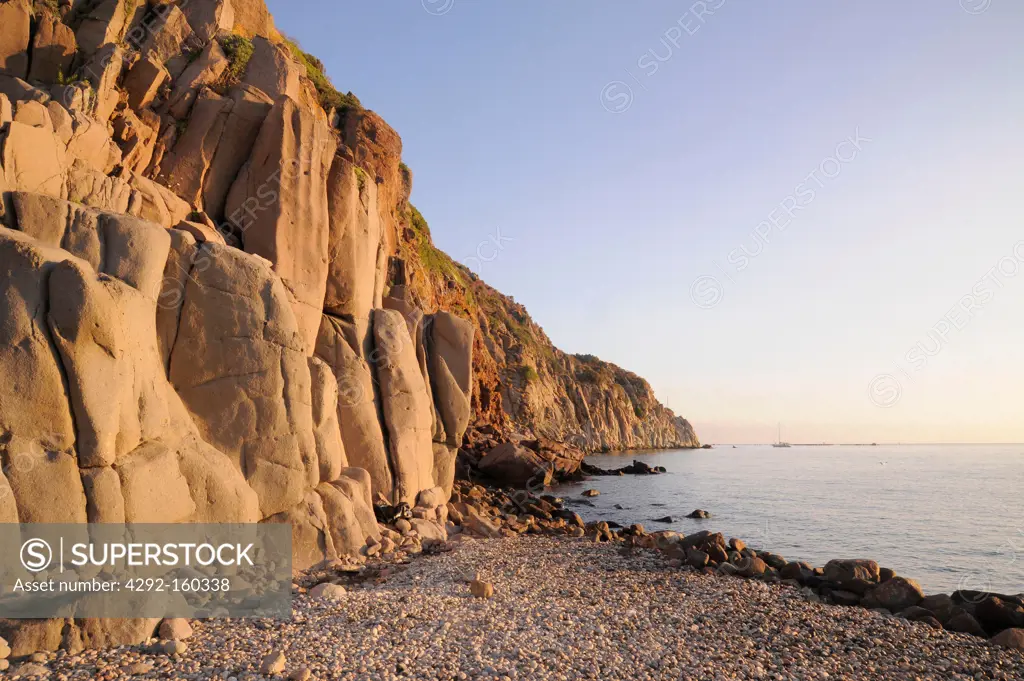 Italy, Capraia island (Tuscan Archipelago), rocks in the bay of the port