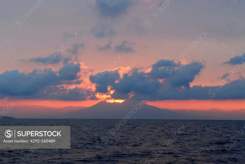 Italy, Campania, the gulf of Naples and Vesuvius volcano seen from the sea at sunrise