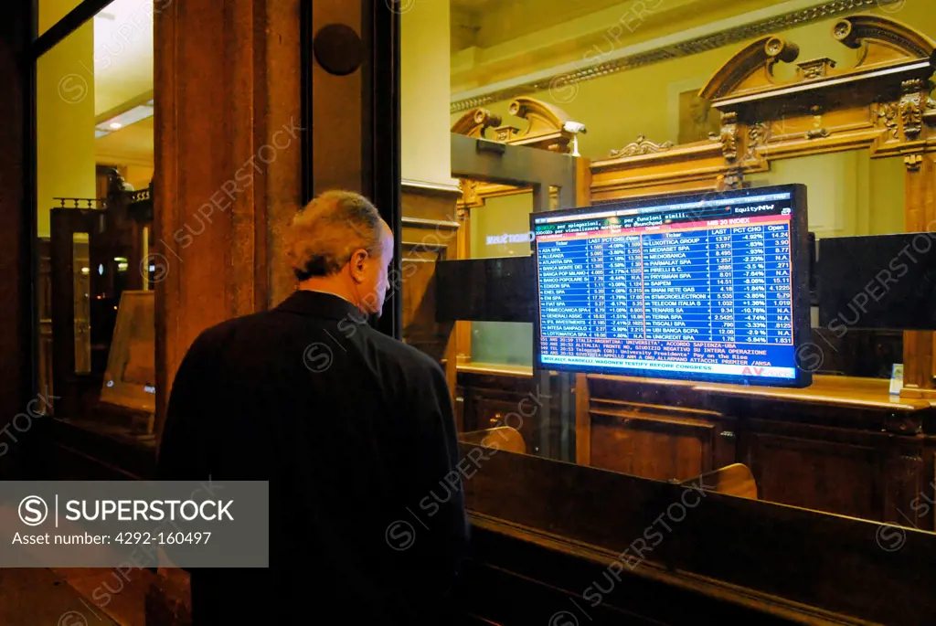 Italy, Milan, display with stock quotes in the bank Cesare Ponti