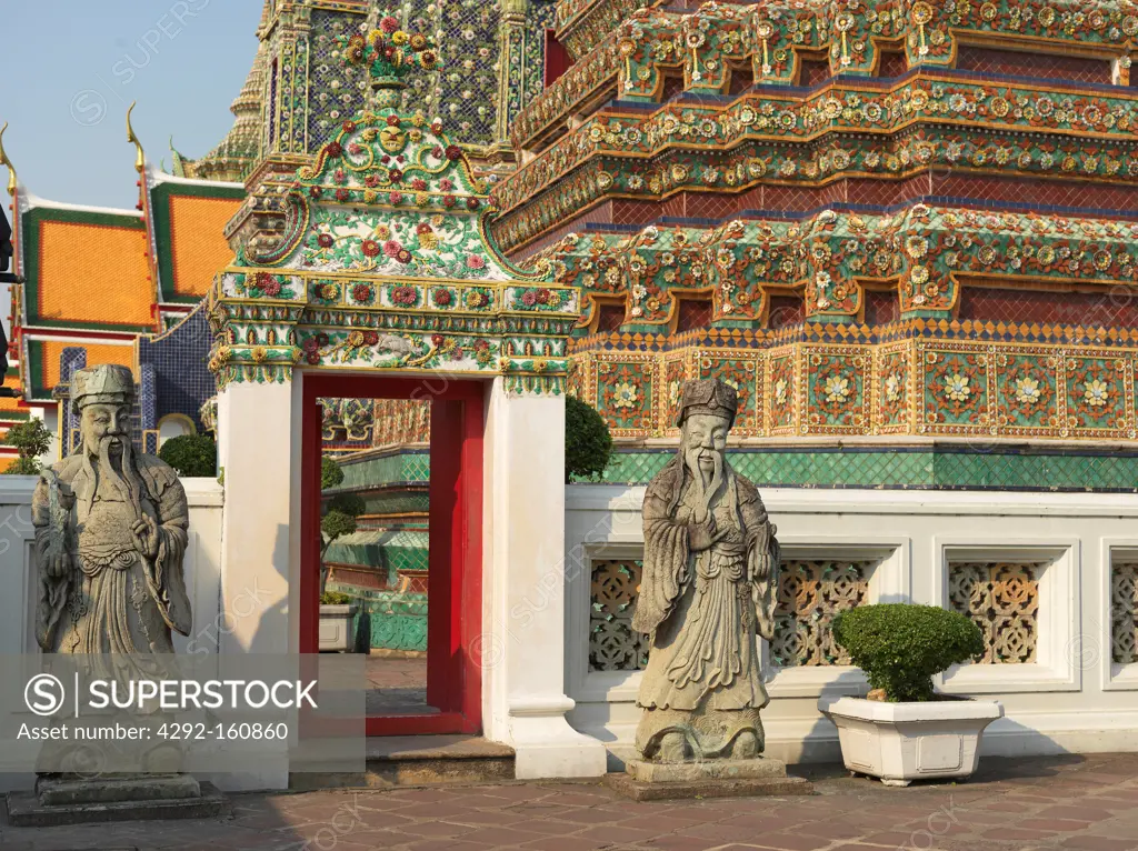 Stone giants inside Wat Pho, Bangkok, Thailand