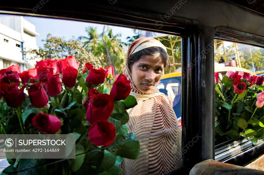 Flowers seller on the road, Mumbai, India