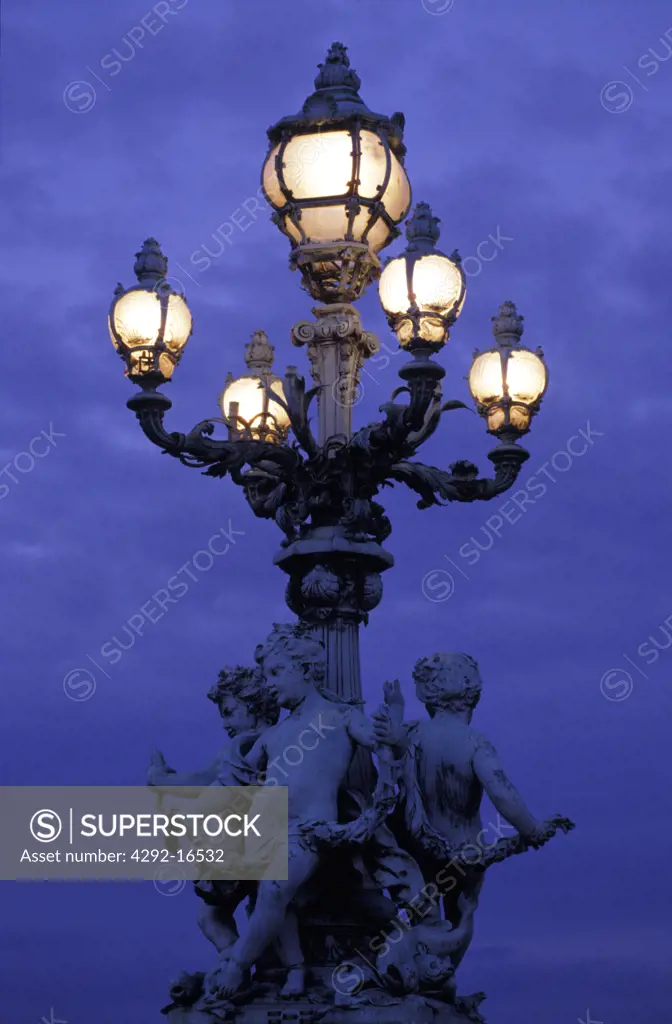 France - Paris, Pont Alexandre III lamp at night