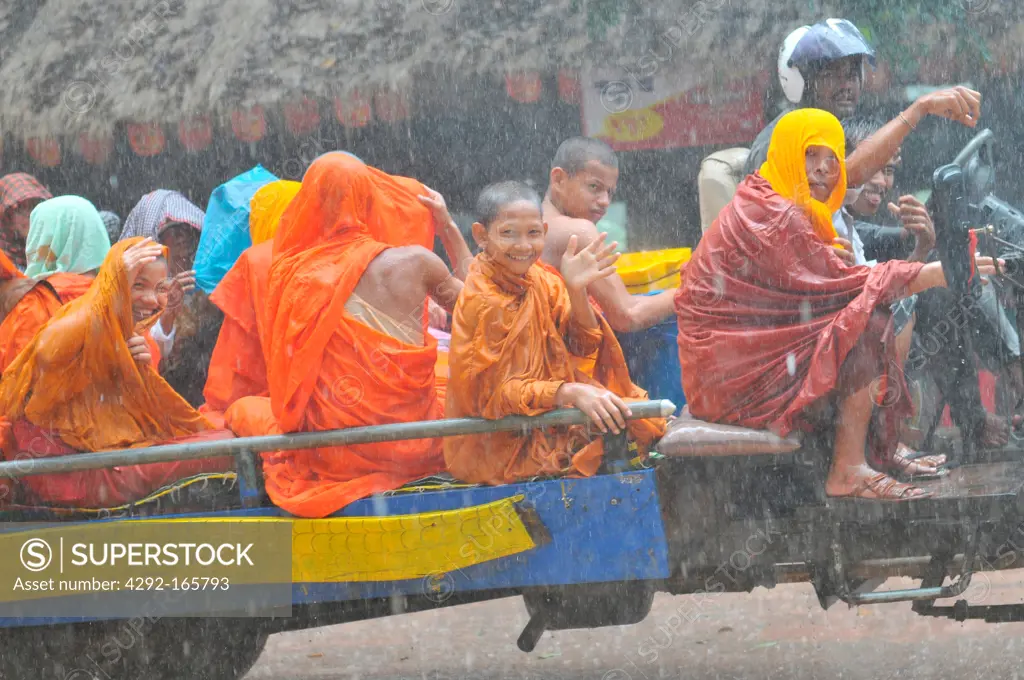 Cambodia, Siem Reap, Monks in the rain