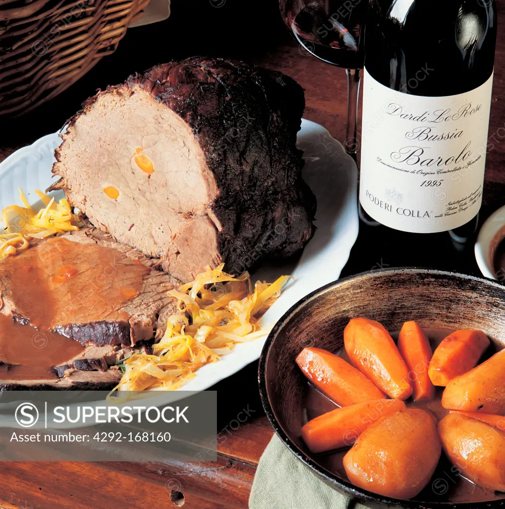 Italy, Piedmont, typical brasato roastbeef with barolo wine and carrots