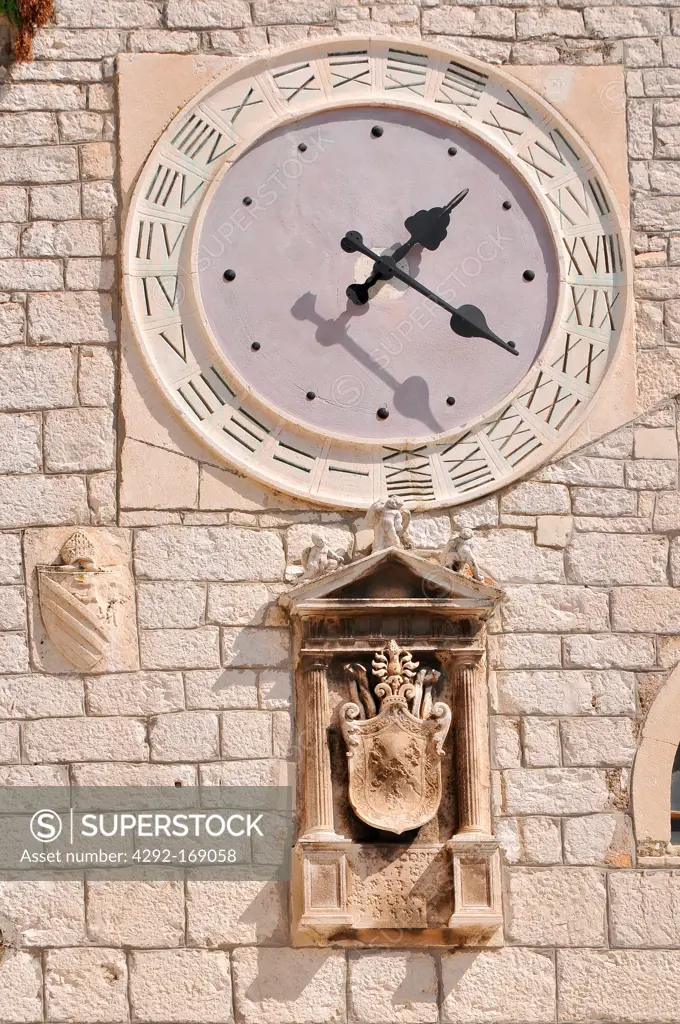 Croatia, Sibenik, Clock in front of Church of St Barbara
