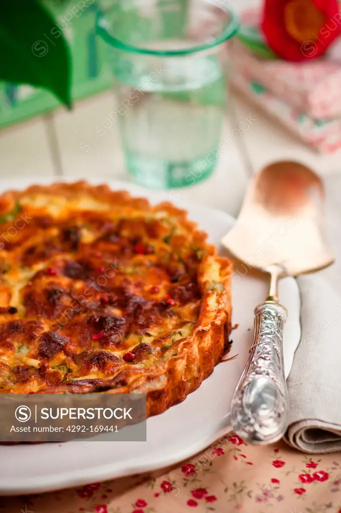 Savory tart with savoy cabbage and pink pepper