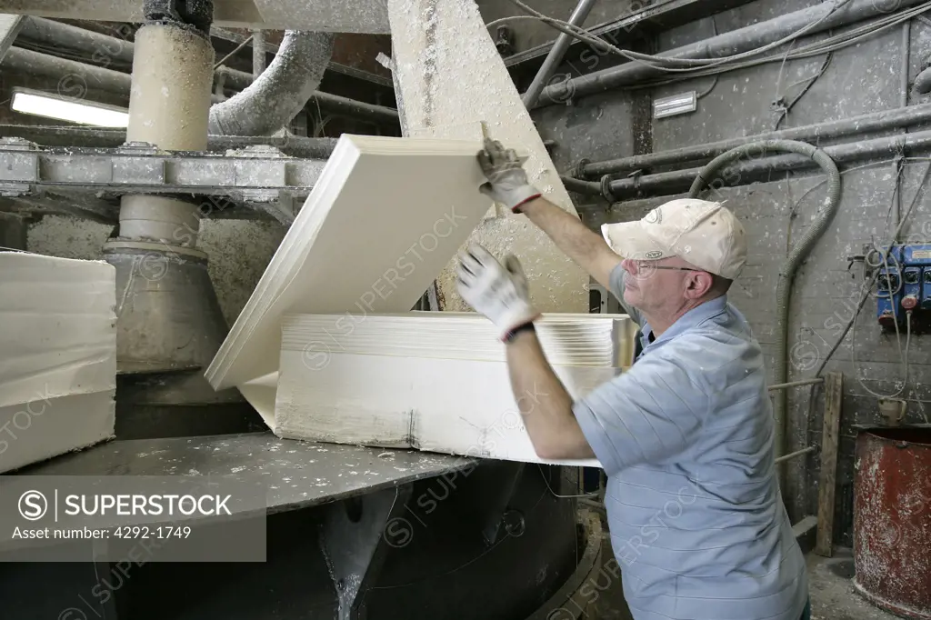 Worker checking celluloseat paper mill