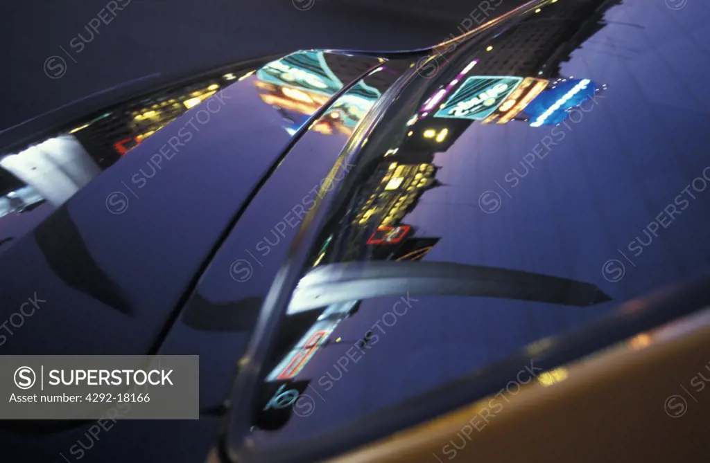 Argentina, Buenos Aires: Plaza de Mayo building and Obelisk reflected on the back window of a car