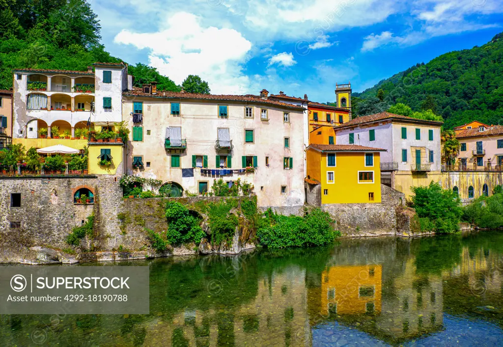 Italy, Bagni di Lucca, houses wih reflection on the Lima River