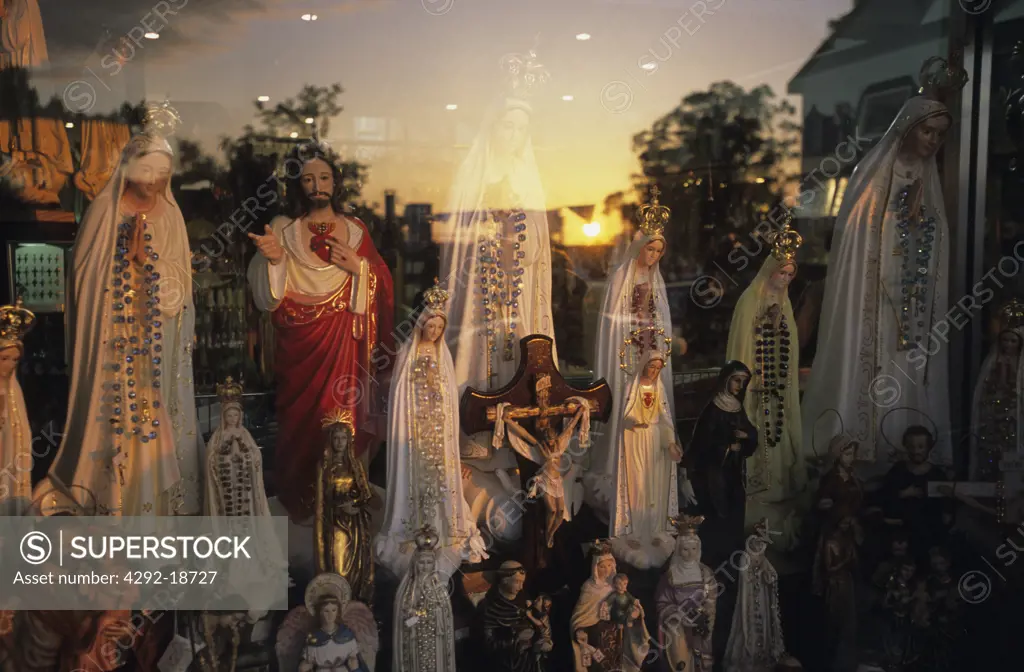 Portugal, Fatima, religious statues in window shop