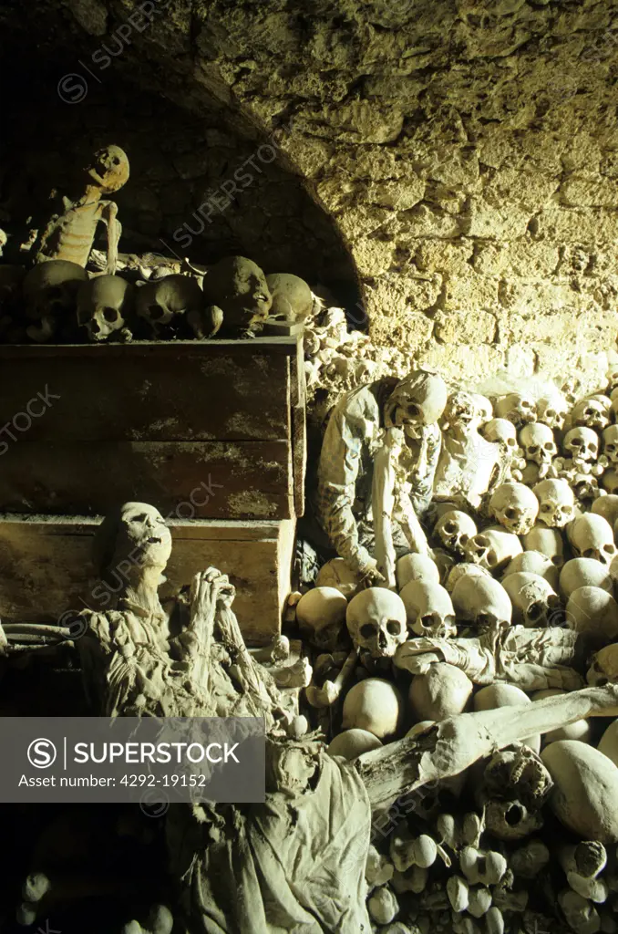 Italy, Umbria, Ferentillo, skeletons in the cemetery of the church