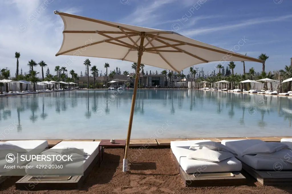 Morocco, Marrakech, la Plage Rouge Resort ,deckchairs and parasol