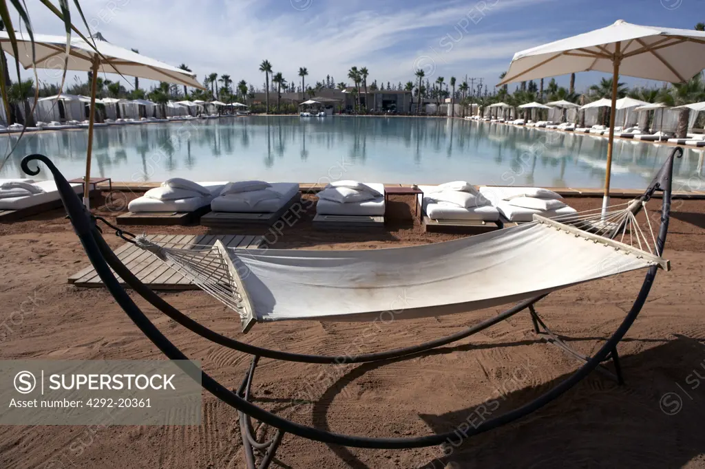 Morocco, Marrakech, la Plage Rouge Resort ,hammock and parasol