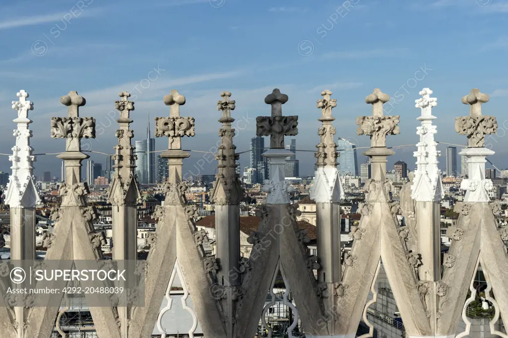 italy, lombardy, milan, duomo spires with cityscape