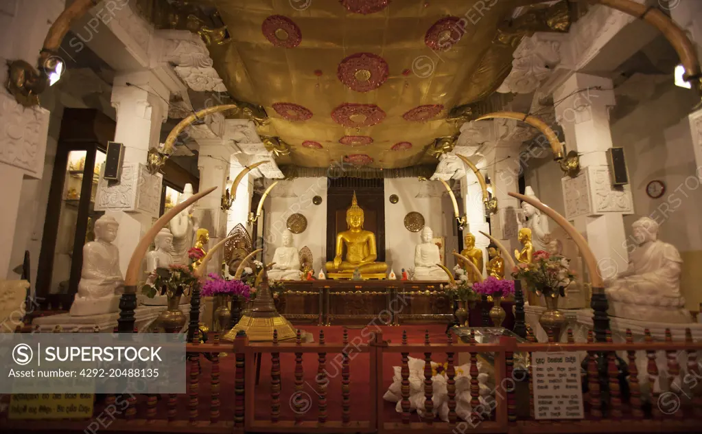 the interior of the temple of the sacred tooth of buddha, kandy, sri lanka.