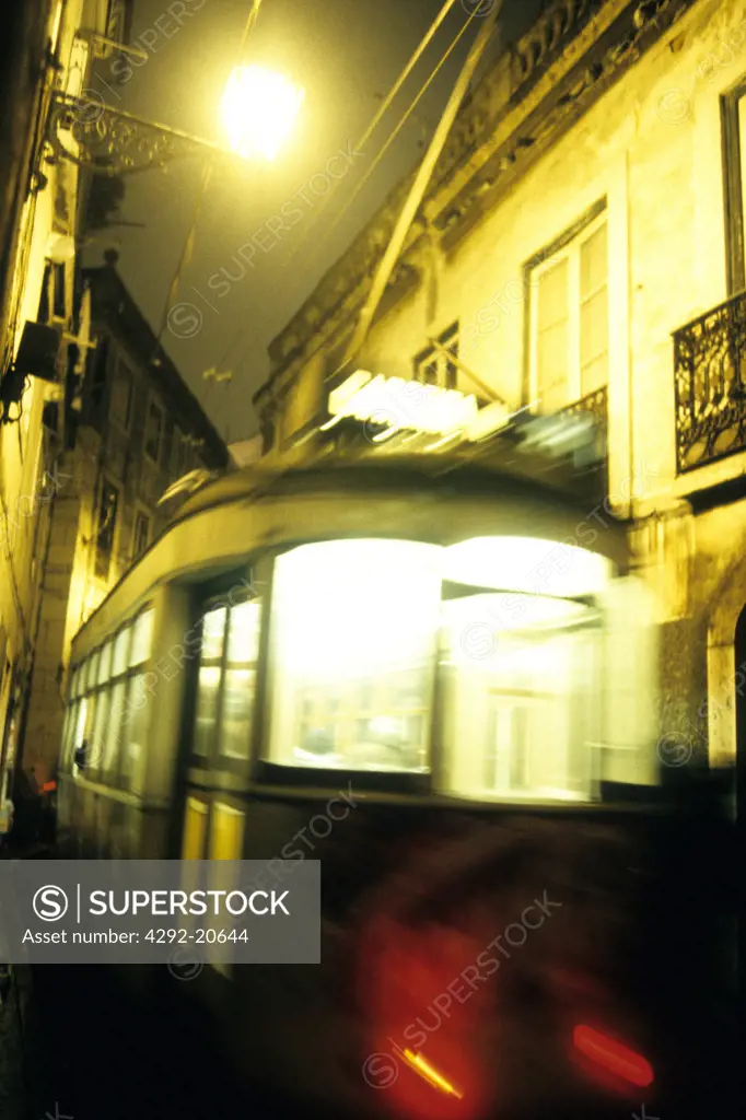 Portugal, Lisbon, Alfama Quarter, Tram at Night.