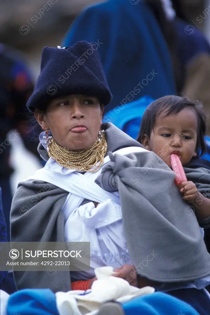 South America, Ecuador. Indios Otabalos, mother and child