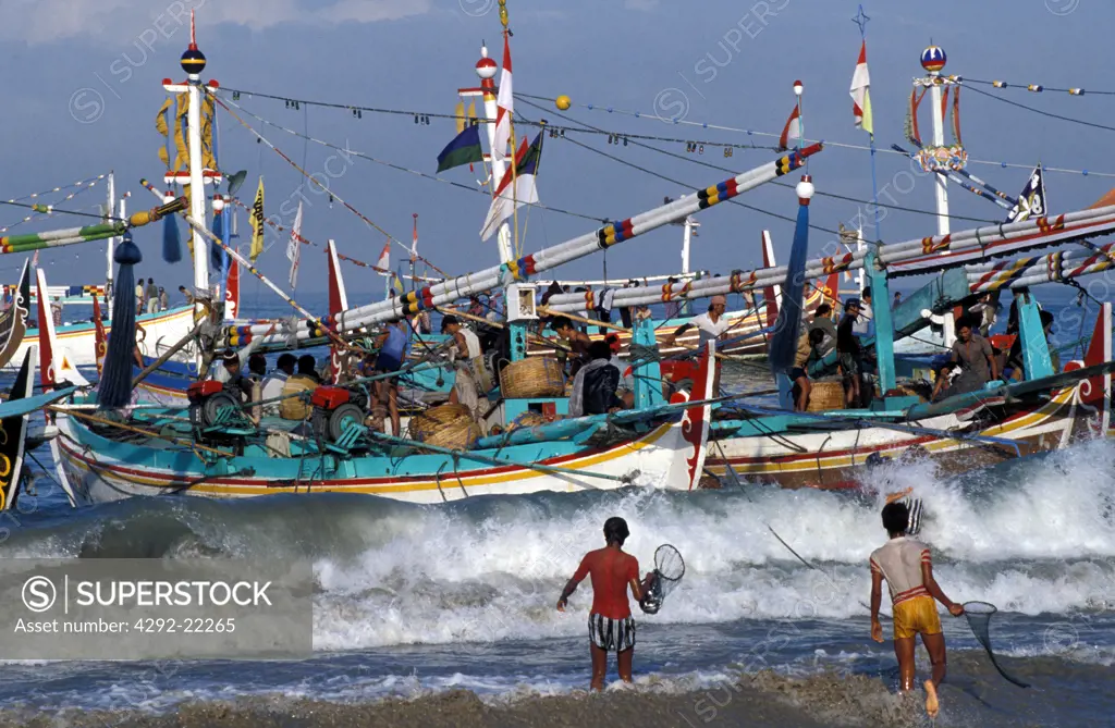 Indonesia, Bali. Fishermen and boats