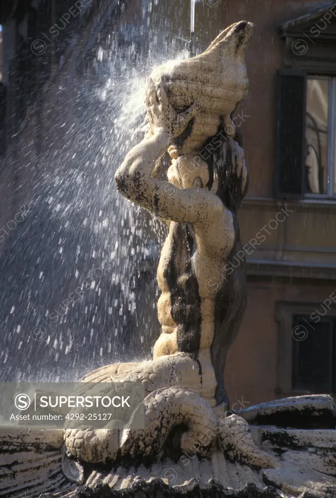 Italy, Rome. Barberini square, detail of Triton fountain