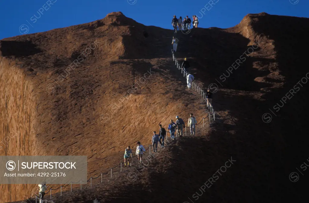 Australia, Northern Territory, Uluru-Kata Tjuta National Park , Uluru (Ayers Rock), tourists climbing to the top