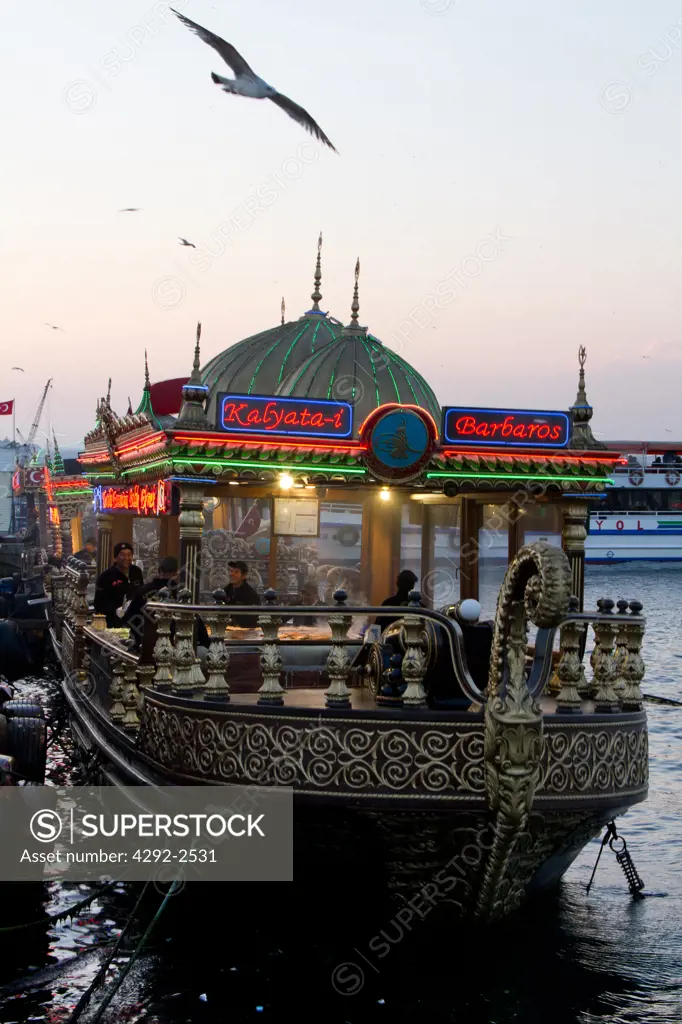 Turkey, Istambul, Floating Fish Restaurant at Dusk