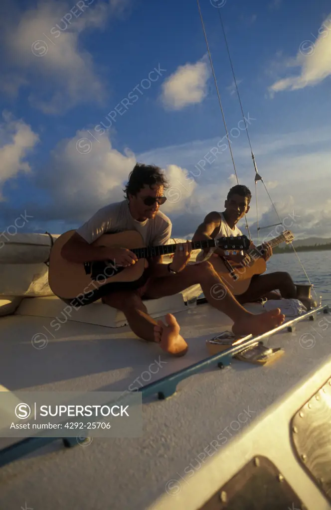 Guitar playing on boat