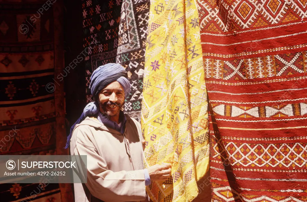 Morocco, Marrakech, carpet shop and salesman